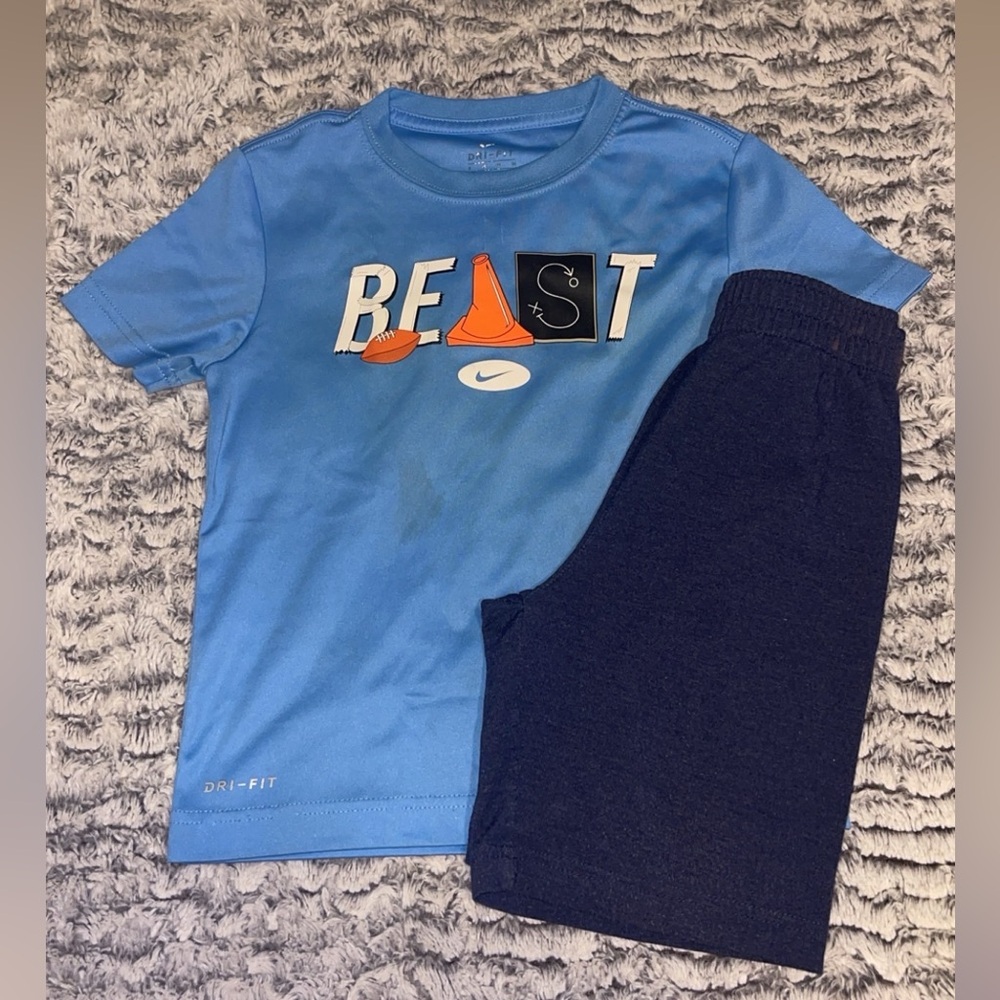 Nike Light Blue Dri-FIT Graphic Tee and Dark Blue Shorts